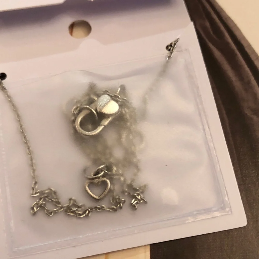 Authentic New on card. kate spade silver-tone glitter spade pendant necklace.